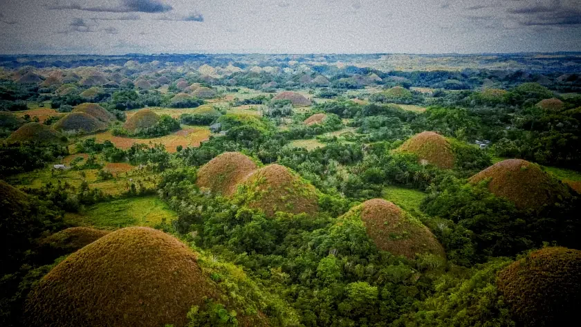 Chocolate Hills Tour Guide 2025: Private vs Shared vs DIY - Your Complete Planning Resource 5 125638 bohol countryside adventure tour Chocolate Hills under a clear sky