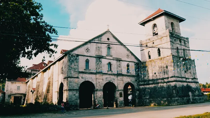 Top 10 Bohol Multi-Day Tour Packages: 2D1N, 3D2N & Cebu-Bohol Combos 8 baclayon church main facade separate watch bell tower dsc1829 w400
