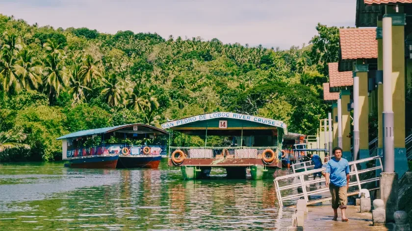 Top 10 Bohol Multi-Day Tour Packages: 2D1N, 3D2N & Cebu-Bohol Combos 10 loboc-river-cruise-boats-at-docking-station