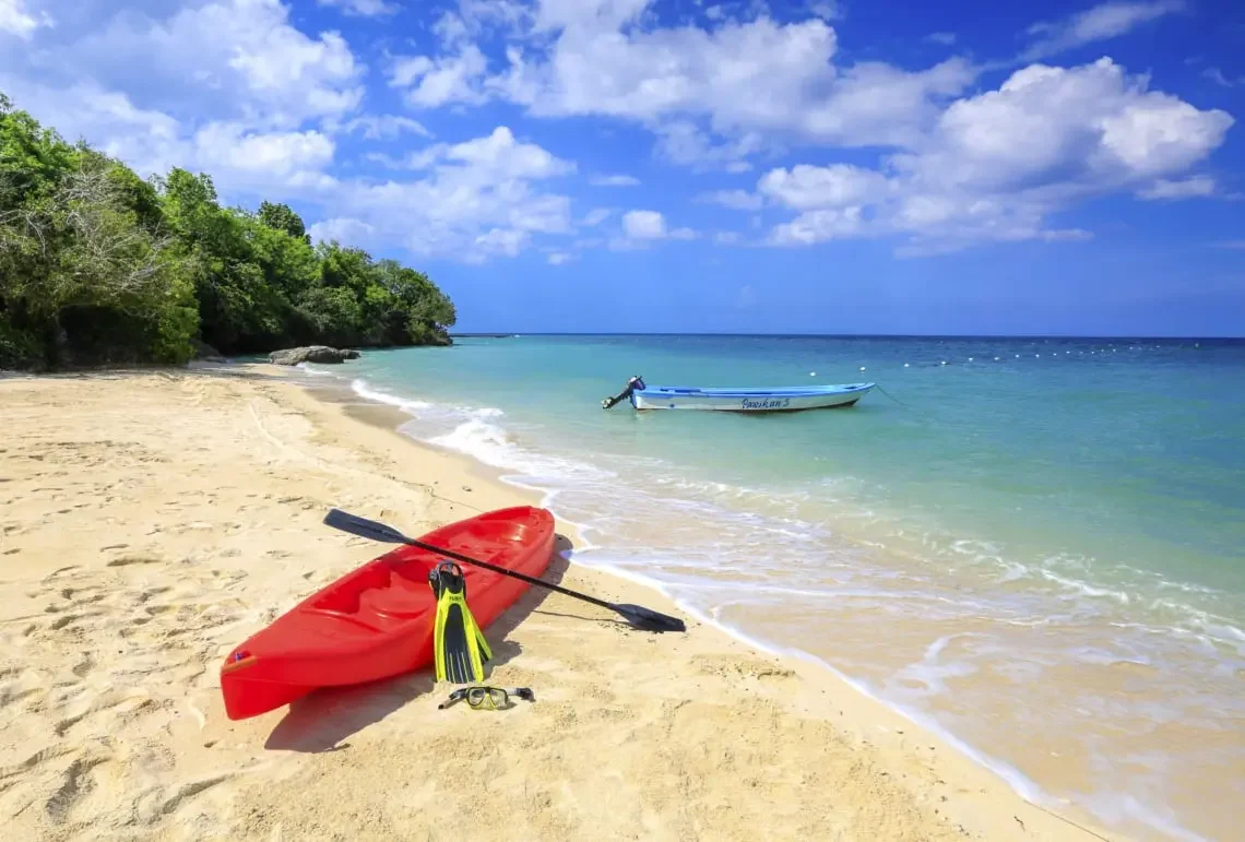 9 Most Spectacular Bohol Beaches: Your Paradise Awaits 1 water activities red kayak sea shore